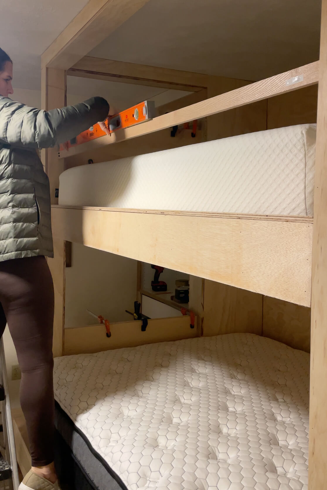 Adding safety railing to a DIY bunk bed.